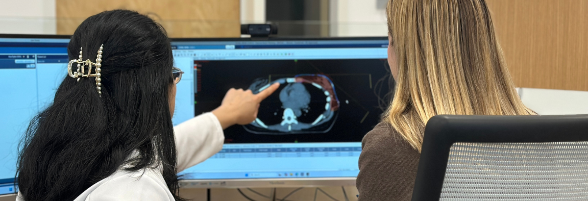 Two Physicians looking at a scan of a heart