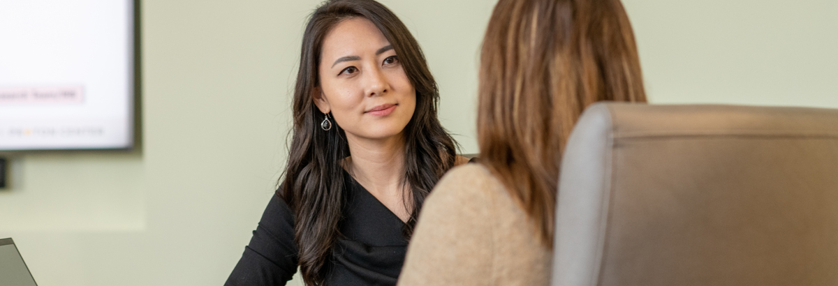 Female doctor speaking with patient