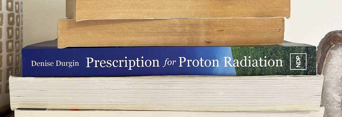 Stack of books including Prescription for Proton Radiation