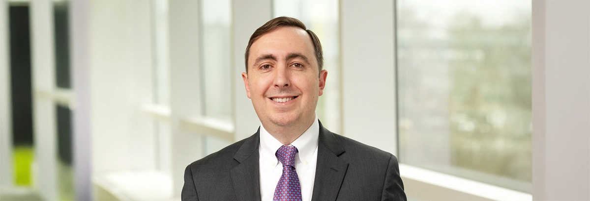 Professional headshot of Dr. Charles B. Simone