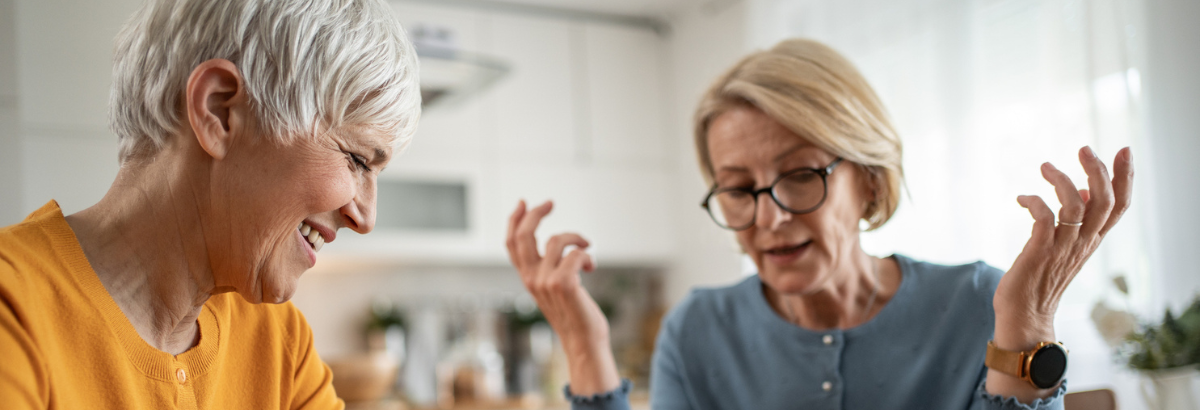 Two women in an intense discussion